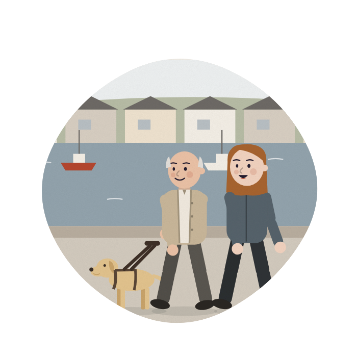 A young woman and her grandad walk to an appointment, his guide dog leading.
