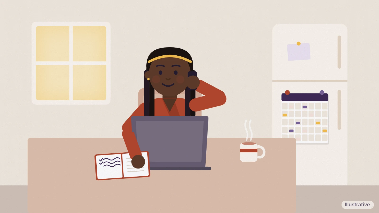 A woman working on a laptop at home takes a phone call, with a shared family calendar on the fridge behind her (illustrative)